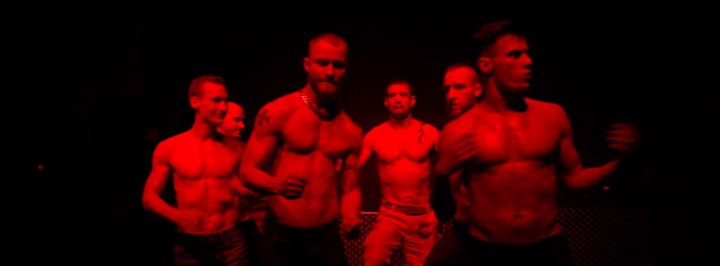 videostill from the movie hyper masculinity on the dancefloor -  fit shirtless men dancing